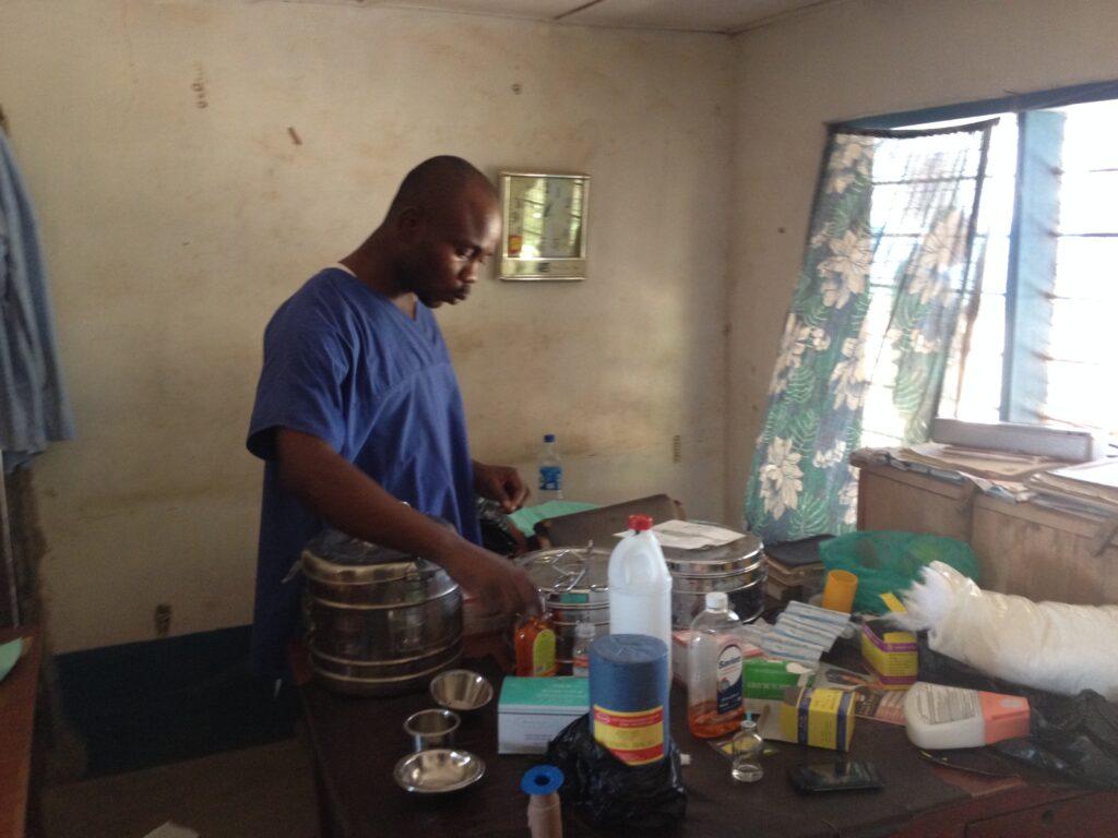 Dr Alex Iorbo checking some surgical equipment