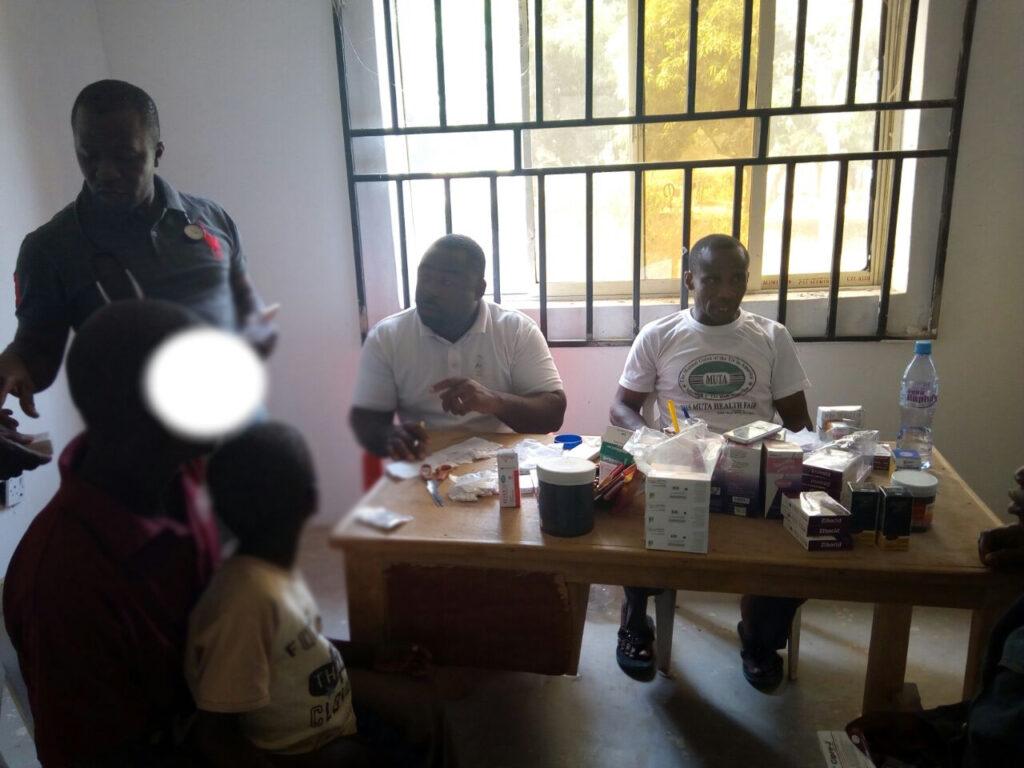 Dr.Luper Uva, Pharm Jerome Annakaa and Pharm Anongo Korsho inside the pharmacy